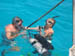 6-03-06 Tobago Keys-Marc and Alex using scuba tank at anchor chain